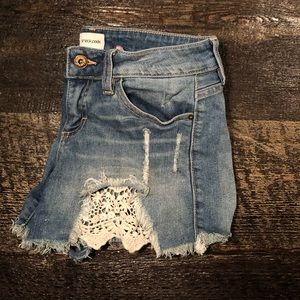 Lace detailed jean shorts